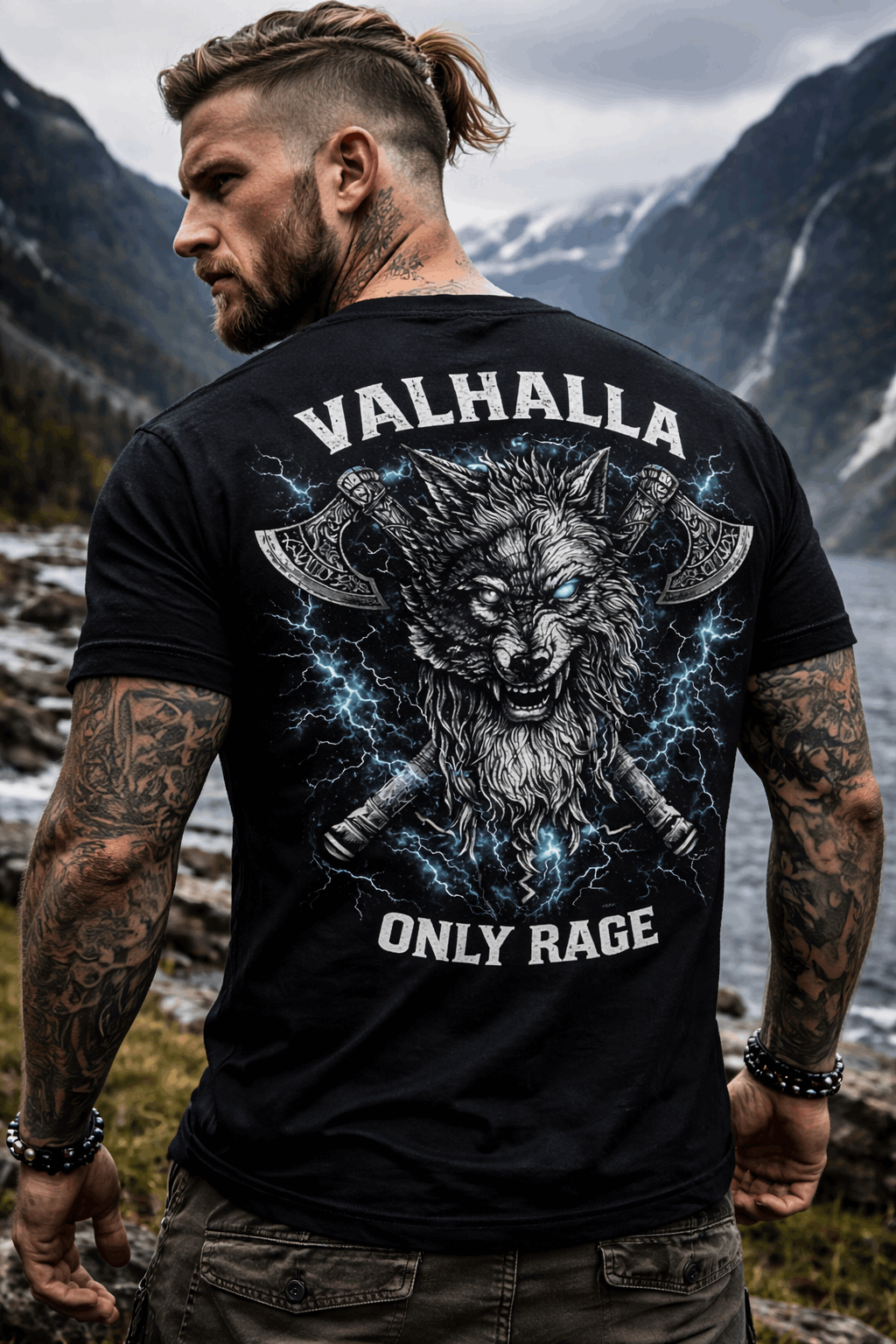 Viking wolf Valhalla Storm streetwear T-shirt worn by tattooed man in Scandinavian mountains